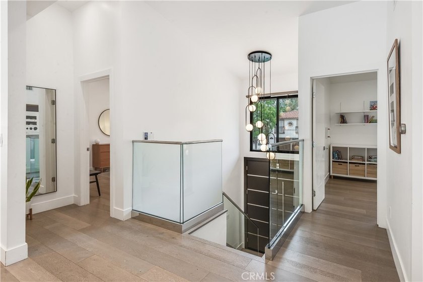 Contemporary elegance meets exceptional craftsmanship in this - photo 12