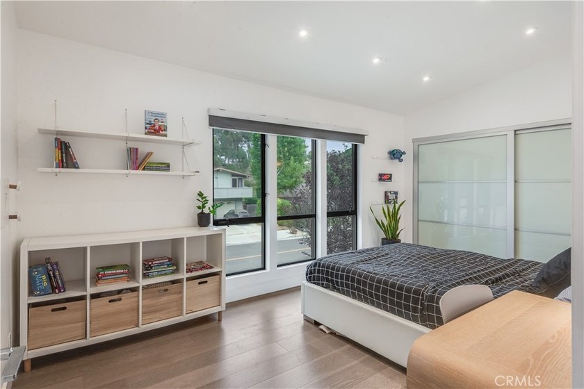 Contemporary elegance meets exceptional craftsmanship in this - photo 16