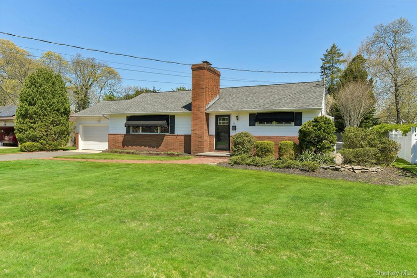 Get ready for summer in this lovely three bedroom ranch in the - photo 4