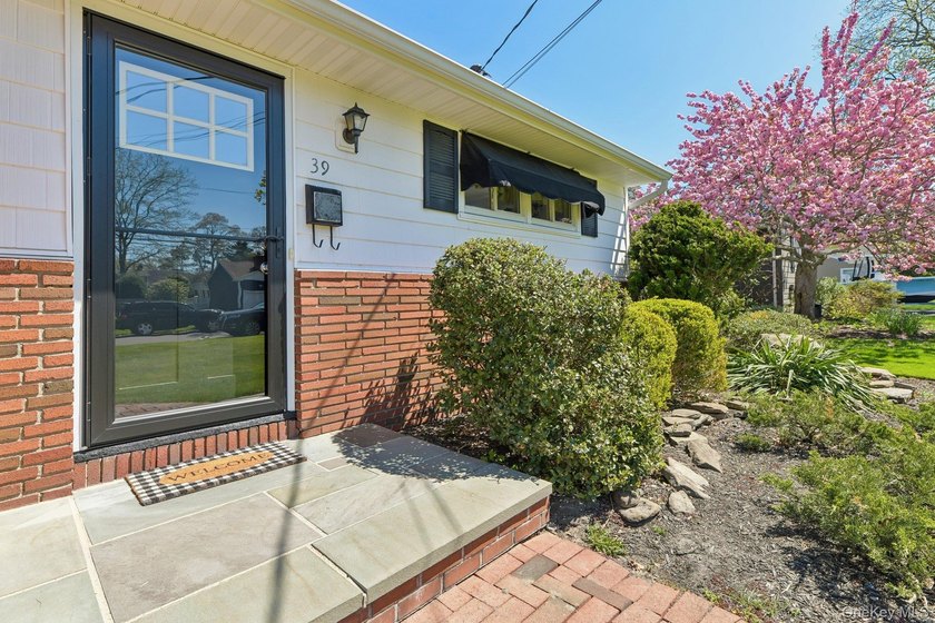 Get ready for summer in this lovely three bedroom ranch in the - photo 5