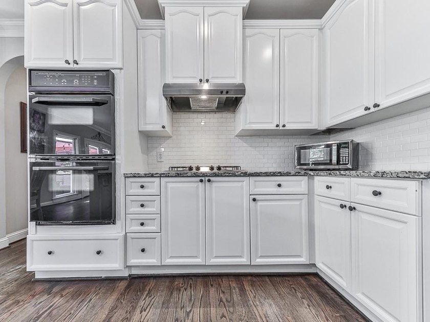 Welcome to this stately 5-bedroom, 4-bath home situated on a - photo 18
