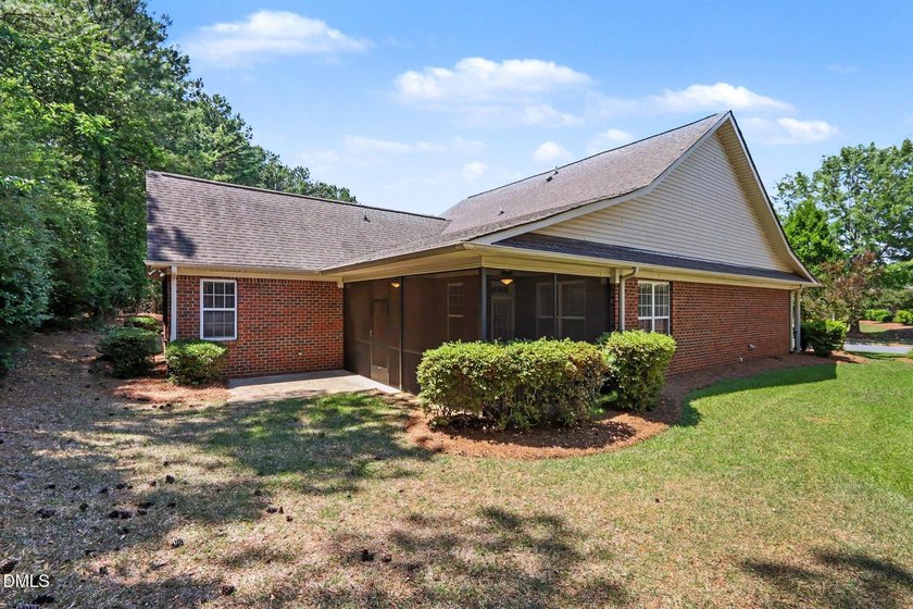 Beautiful brick ranch with custom moldings, tray ceilings, and a - photo 25