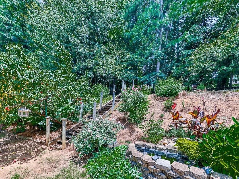 Welcome to this stately 5-bedroom, 4-bath home situated on a - photo 42