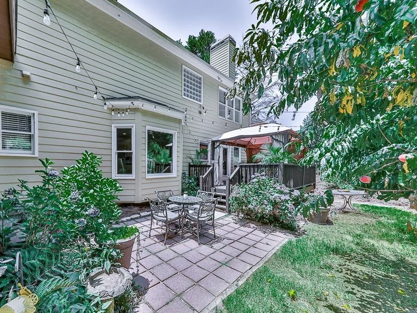 Welcome to this stately 5-bedroom, 4-bath home situated on a - photo 44