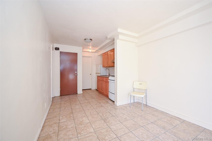 Semi-detached brick 2-family in prime Flushing, across from - photo 6