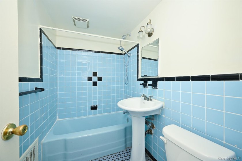 Semi-detached brick 2-family in prime Flushing, across from - photo 8