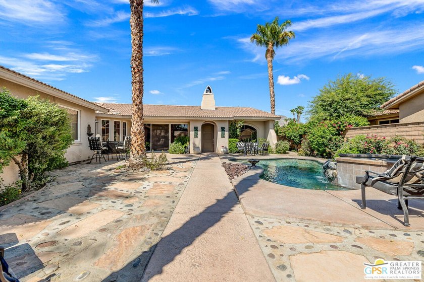 Welcome to 49425 Rio Arenoso, an exceptional residence located - photo 4