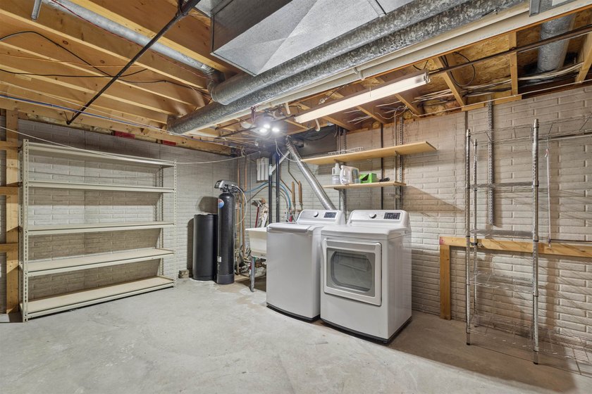 Nestled on over 1/2 acre, this well-maintained home is tucked - photo 31