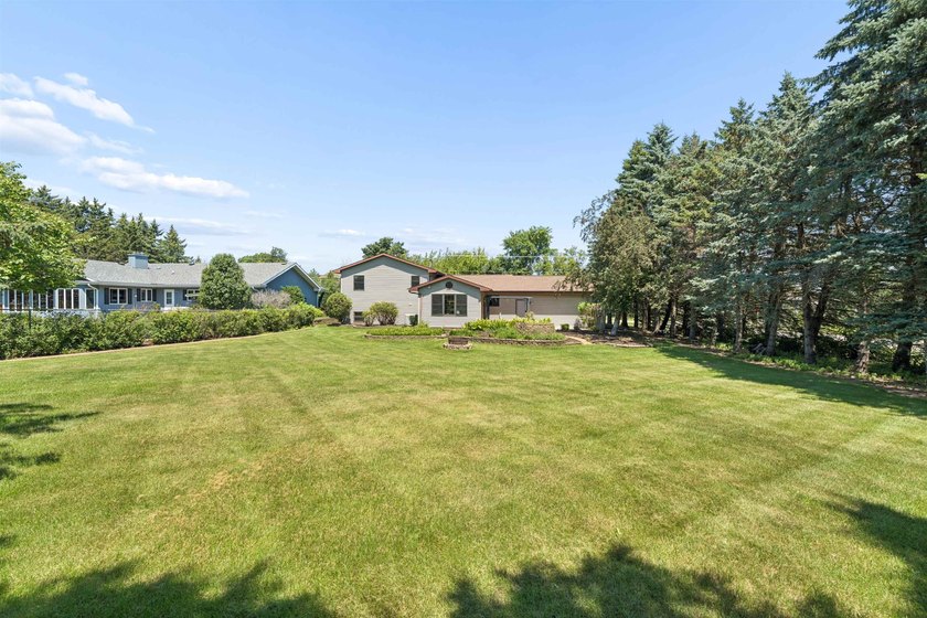 Nestled on over 1/2 acre, this well-maintained home is tucked - photo 36