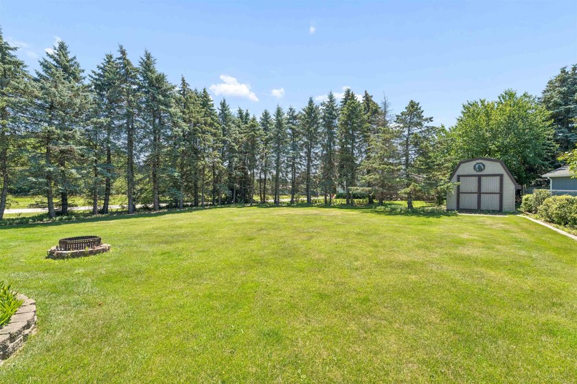 Nestled on over 1/2 acre, this well-maintained home is tucked - photo 38