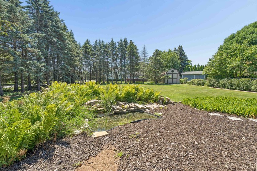 Nestled on over 1/2 acre, this well-maintained home is tucked - photo 39