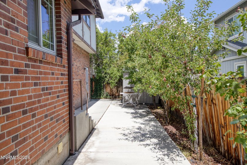 Discover the timeless charm of this classic 1937 brick cottage - photo 32