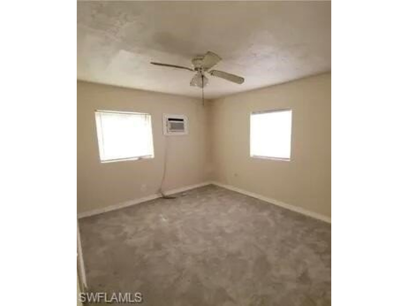 Welcome to this inviting home located in Fort Myers. Walking - photo 11
