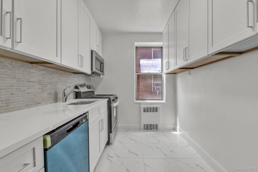 Sponsor Unit! This beautifully renovated one bedroom corner - photo 10