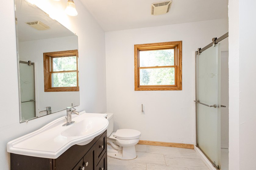 Enjoy the perfect blend of space, updates, and location on this - photo 17