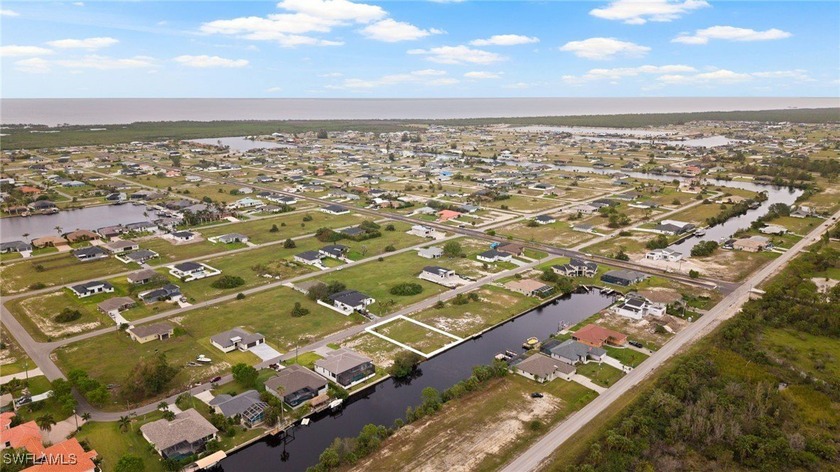 DIRECT GULF ACCESS lot! Seawall and Concrete DOCK in place on - photo 3