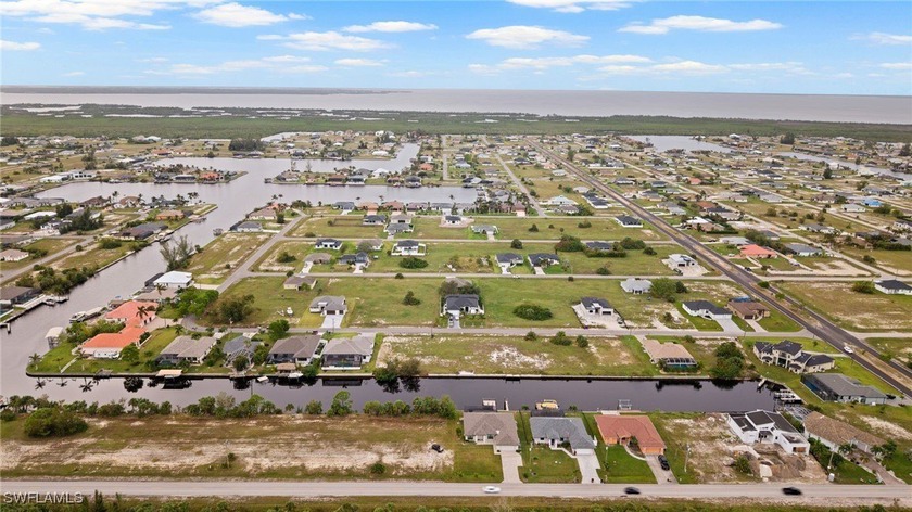 DIRECT GULF ACCESS lot! Seawall and Concrete DOCK in place on - photo 8