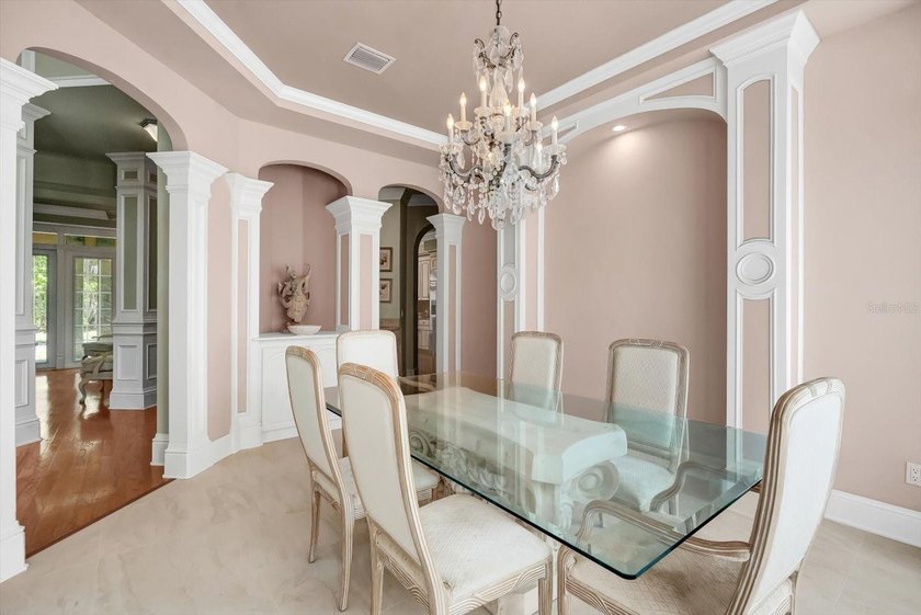 Tucked away in the prestigious Sugar Mill Plantation, this - photo 15