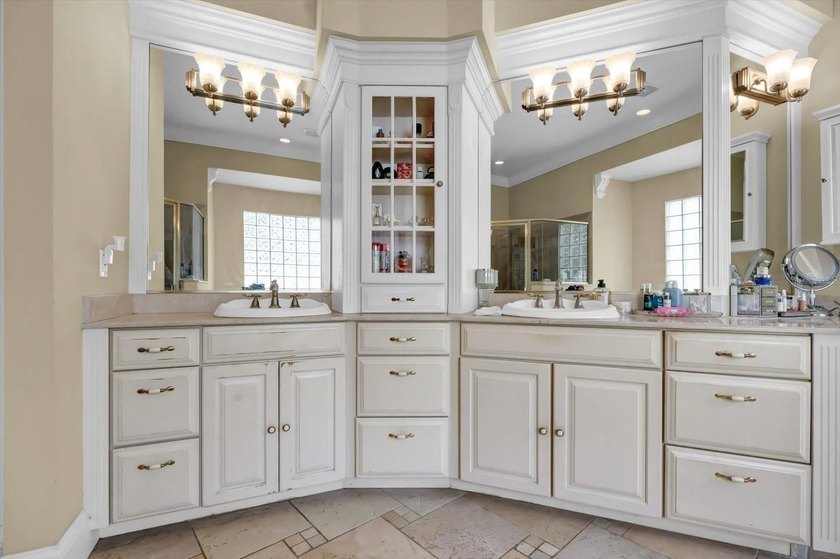 Tucked away in the prestigious Sugar Mill Plantation, this - photo 36