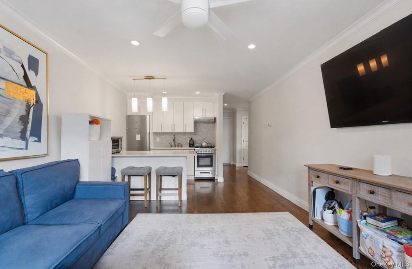 Why rent when you can own? This beautifully updated unit offers - photo 2