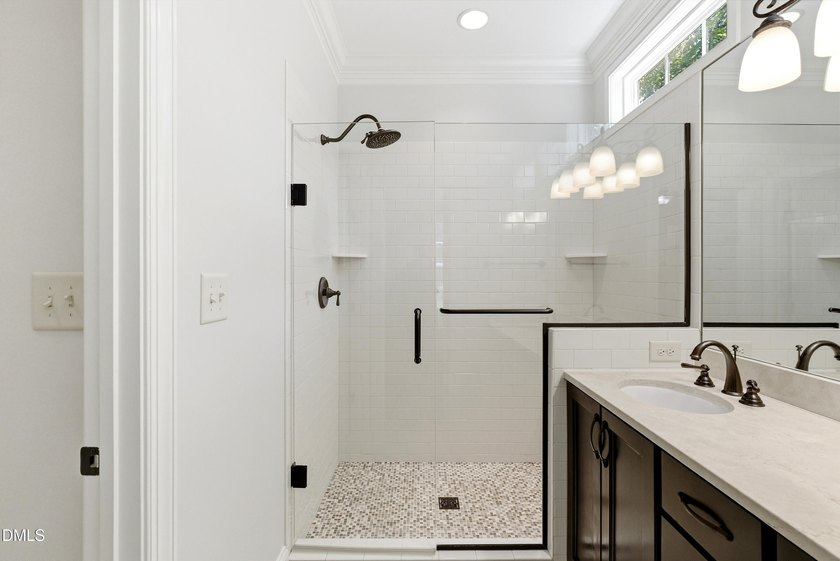 Tucked on a private 0.41-acre homesite in North Raleigh's - photo 22