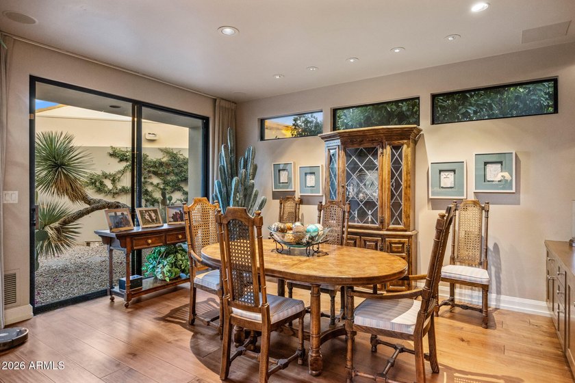 Refined desert living beckons beyond a striking glass gated - photo 15