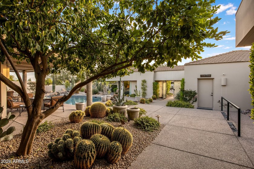 Refined desert living beckons beyond a striking glass gated - photo 33