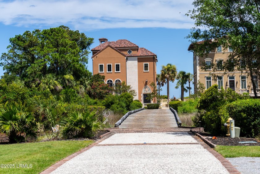 Cross your private bridge into one of Hilton Head Island's most - photo 9
