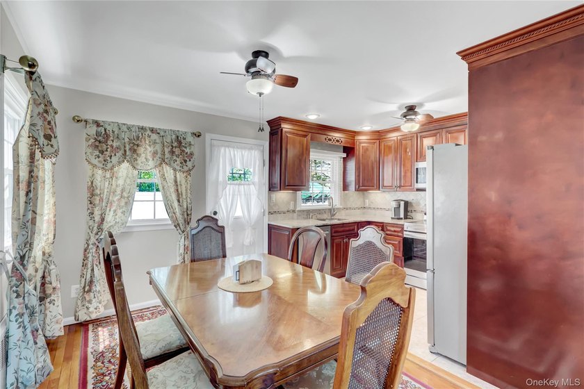 This beautifully maintained ranch offers the perfect blend of - photo 7