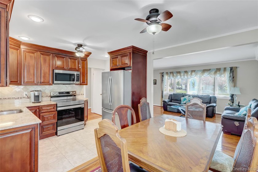 This beautifully maintained ranch offers the perfect blend of - photo 8
