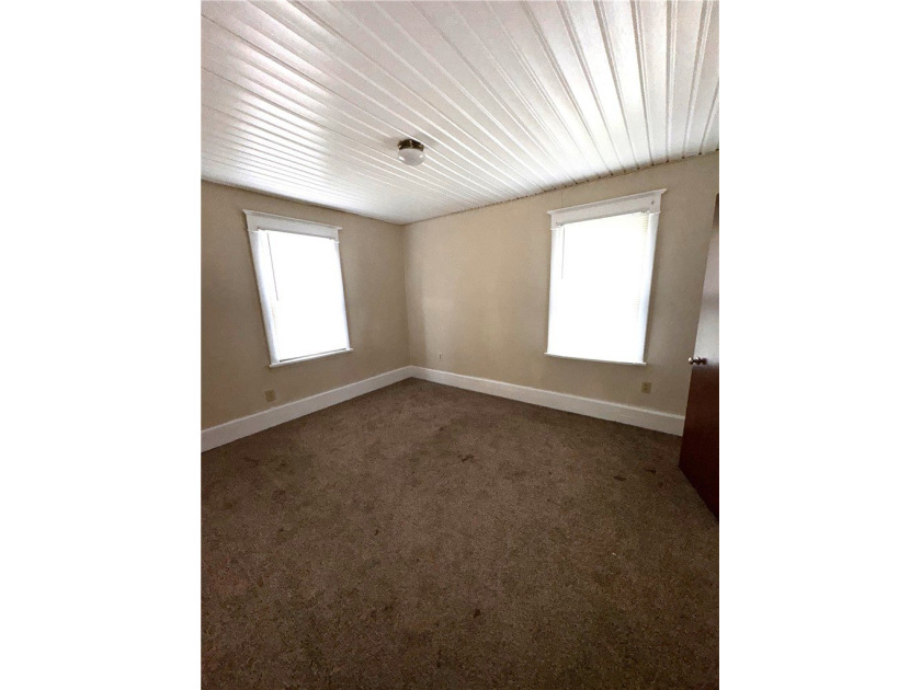 Excellent investment opportunity or owner occupant duplex in the - photo 3