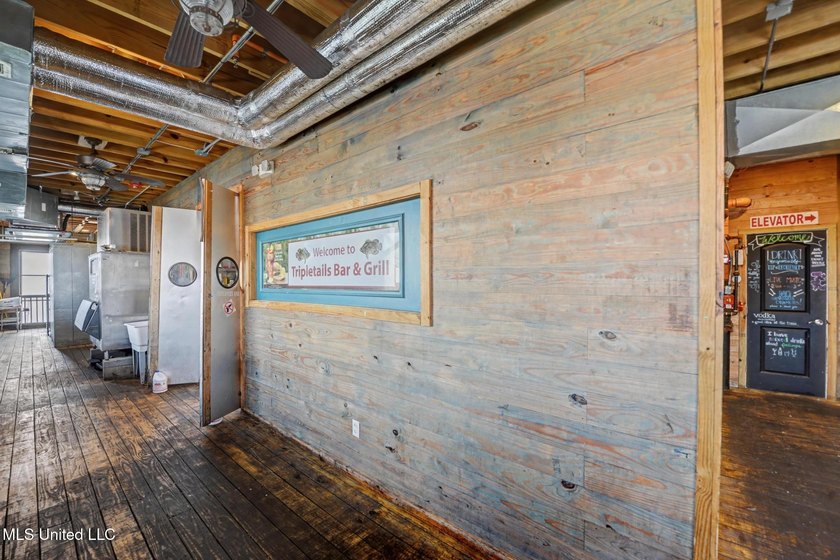 In the vibrant core of Old Town Bay St. Louis, where coastal - photo 23