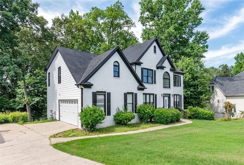 Discover this expansive and inviting traditional home nestled in - photo 2