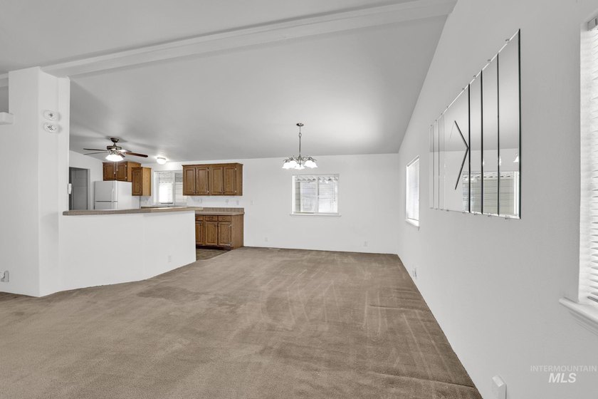 Welcome home to this inviting 3-bedroom, 2-bath manufactured - photo 3