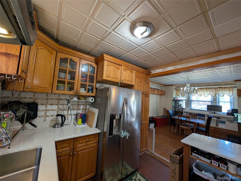 Welcome to this well maintained 5-bedroom, 2-bathroom home in - photo 7