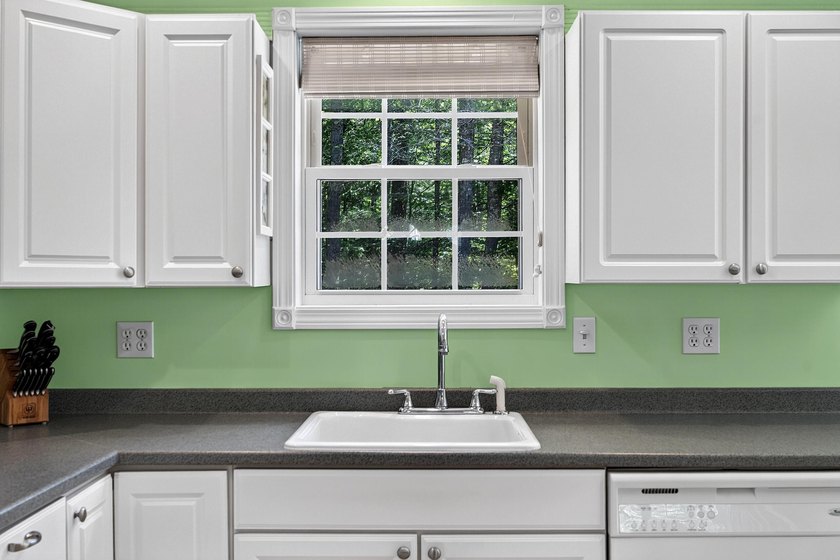 Quality-built and low maintenance, this charming two-bedroom - photo 14