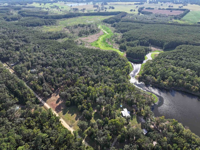 Seller Motivated to Sell! Discover 14.9 acres of pristine - photo 2
