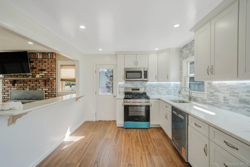 Welcome To This Beautifully Updated Cape-Style Home Located In - photo 6