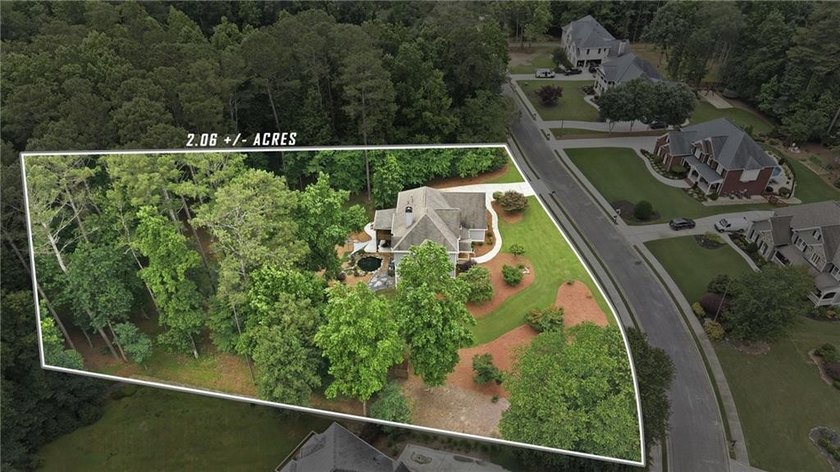 Welcome to a rare opportunity to own a private 2.06-acre estate - photo 5
