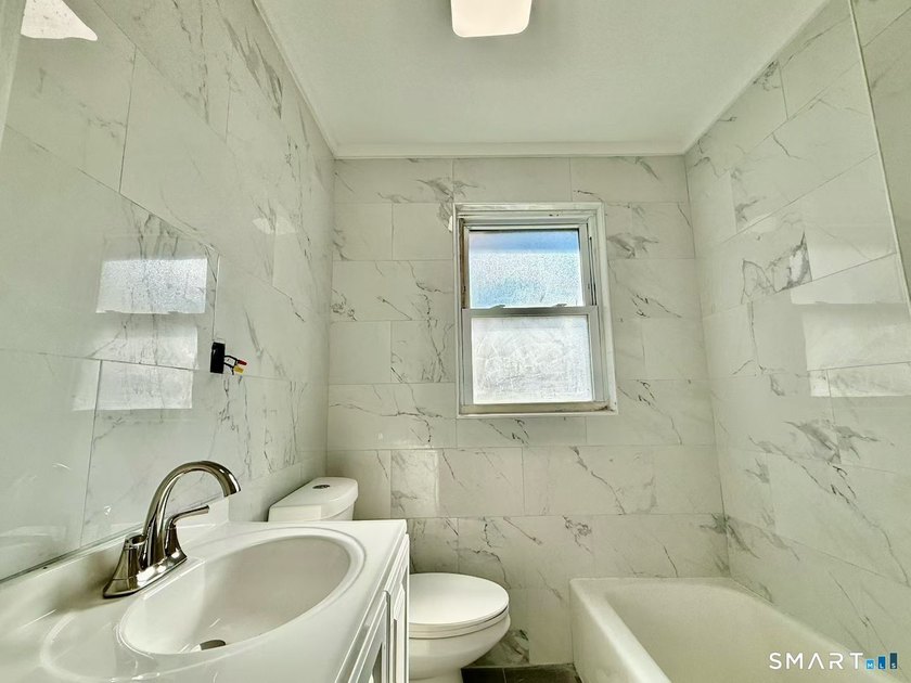 Rental Income $3,600 + $2,600. Cap Rate 7%+. Spacious Stamford 2 - photo 4