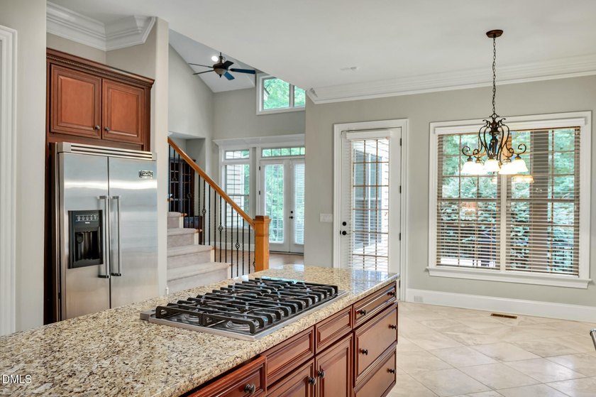 Nestled on a private, acre-plus, cul-de-sac homesite within the - photo 11