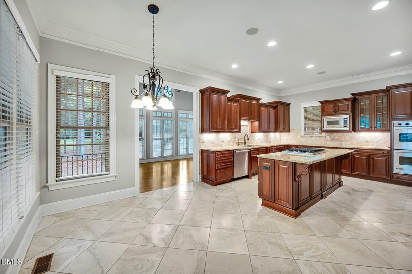 Nestled on a private, acre-plus, cul-de-sac homesite within the - photo 12