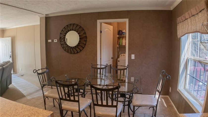 This charming 1,350 sq ft manufactured home sits on a permanent - photo 13