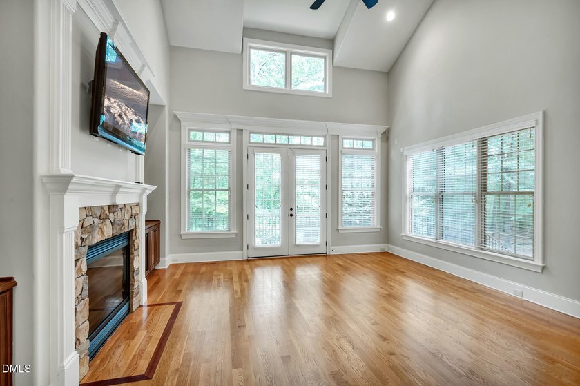 Nestled on a private, acre-plus, cul-de-sac homesite within the - photo 13