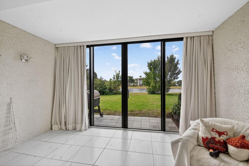 IMPACT WINDOS! Low down Payment This first-floor residence - photo 14