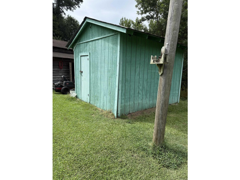 This 2 BR 1.5 Bath fixer upper is a nice 2 acre rural property - photo 16