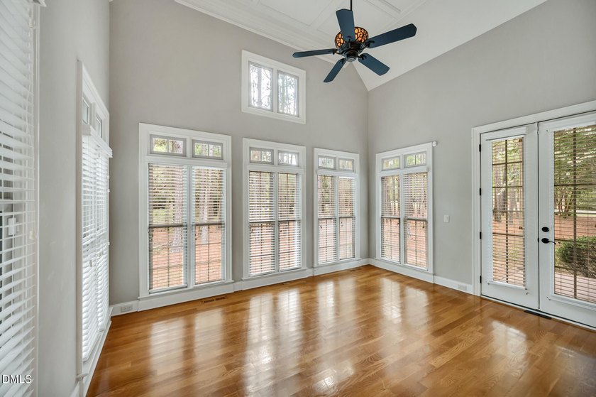 Nestled on a private, acre-plus, cul-de-sac homesite within the - photo 16