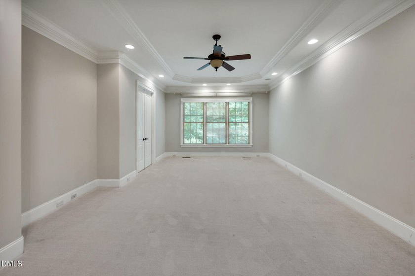 Nestled on a private, acre-plus, cul-de-sac homesite within the - photo 17