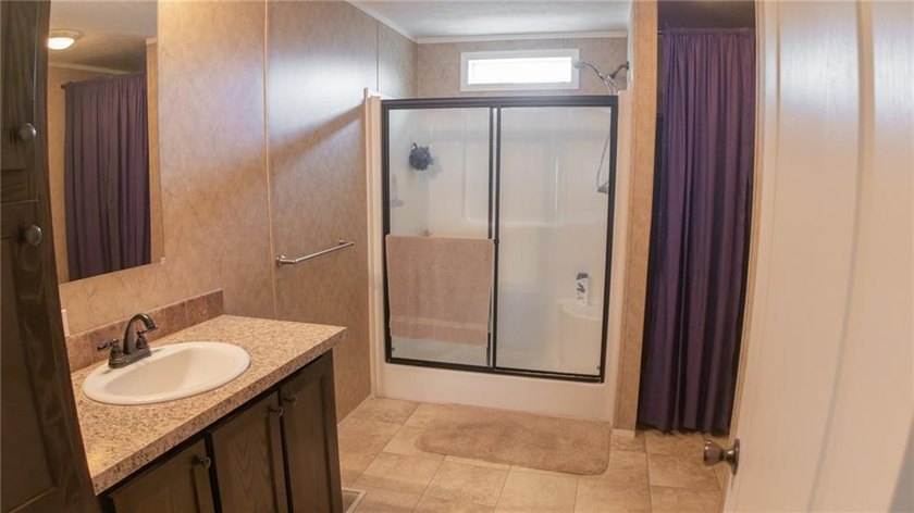 This charming 1,350 sq ft manufactured home sits on a permanent - photo 18