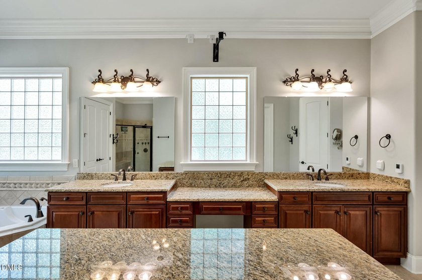 Nestled on a private, acre-plus, cul-de-sac homesite within the - photo 19